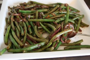 Stir fry with garlic and coconut oil and then add a splash.